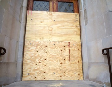 boarded-up-entrance-to-church-after-removal-of-doors-767x600